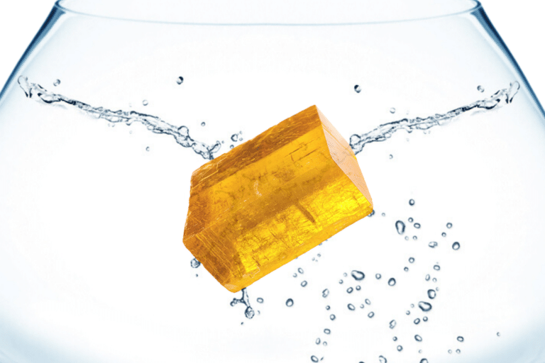 honey calcite in water